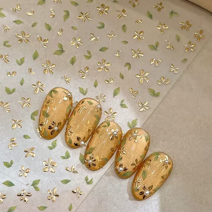 Autocollant pour ongles en feuille d'or, fleur à cinq pétales, fleurs de printemps bronzantes, suppo