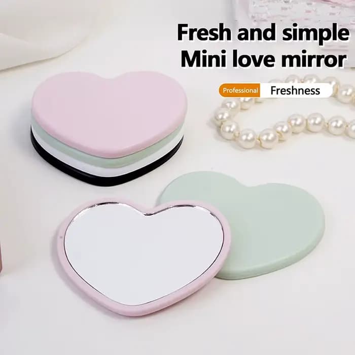 Miroir de maquillage en forme d'amour