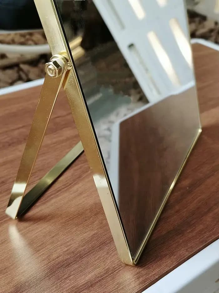 Miroir de maquillage rotatif en métal