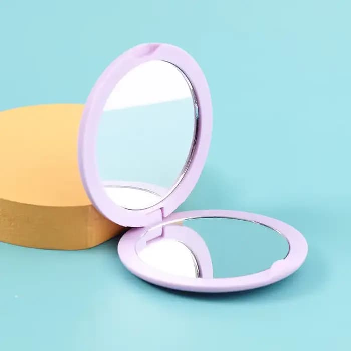 Miroir double face pliable rond