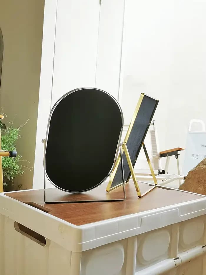 Miroir de maquillage rotatif en métal