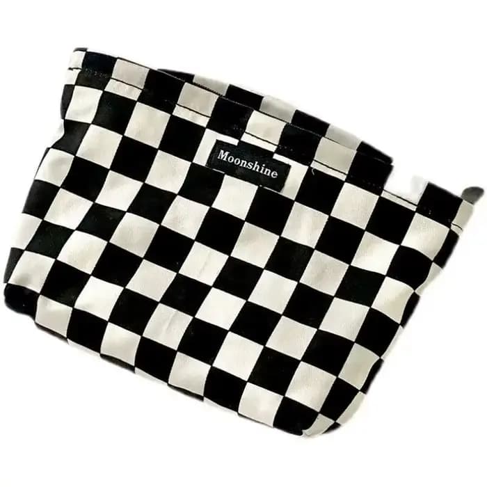 Sac à cosmétiques à carreaux noir et blanc
