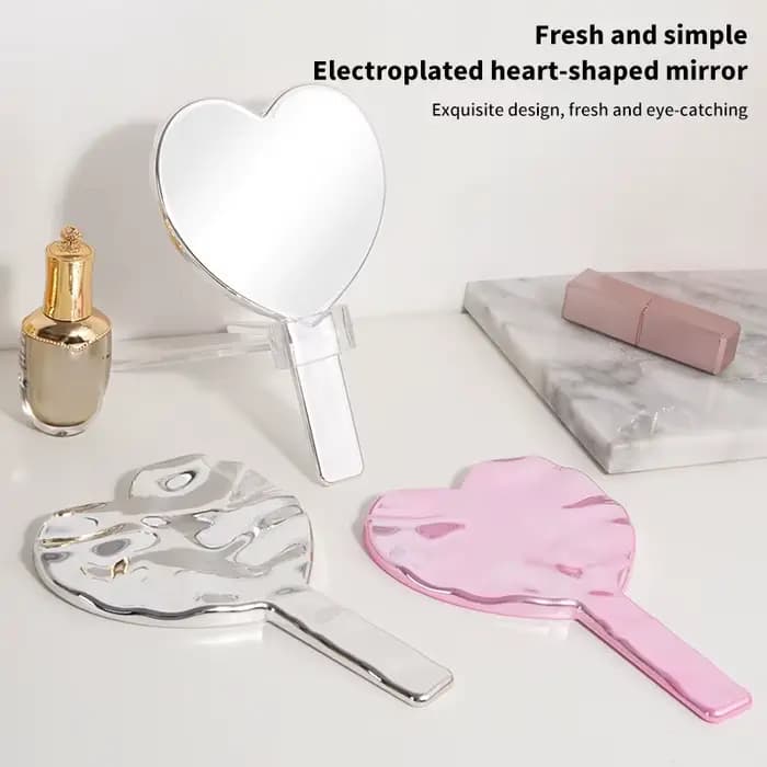Miroir de maquillage avec poignée en forme de cœur pour femme