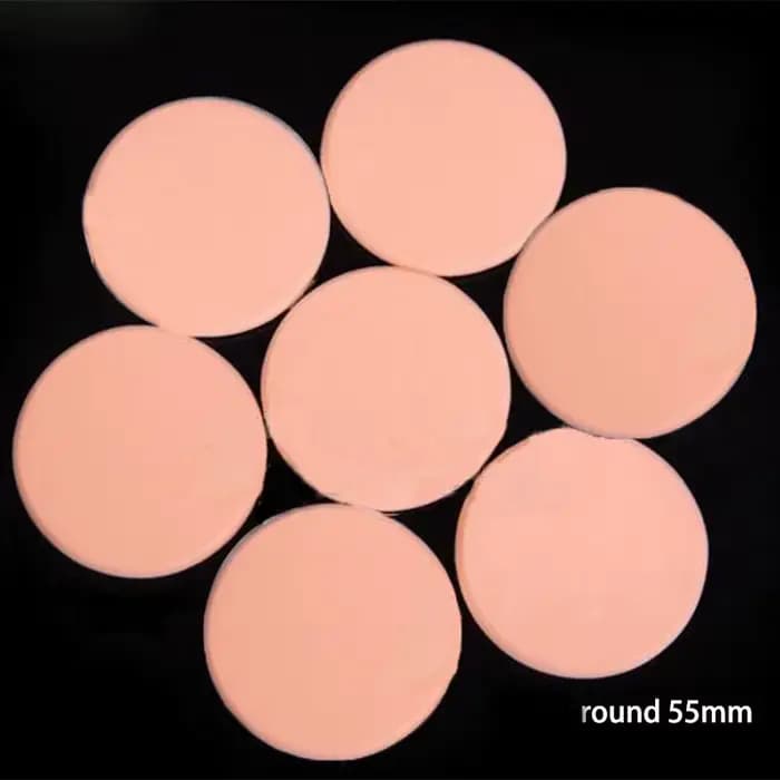 Bouffée de poudre cosmétique pour le visage