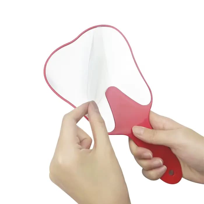 Miroir à poignée dentaire en forme de dent