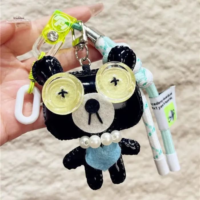 Porte-clés de luxe en cuir PU, drôle, bouton, poupées, pendentif, ornement de sac exquis, accessoires de sac/décor de clé