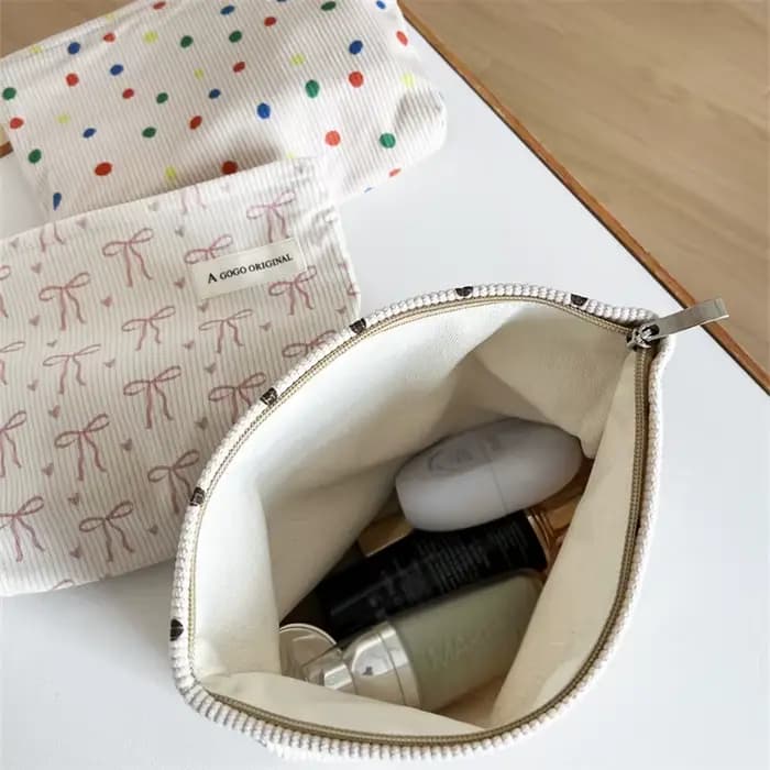 Trousse de maquillage de voyage en velours côtelé avec motif d'arc