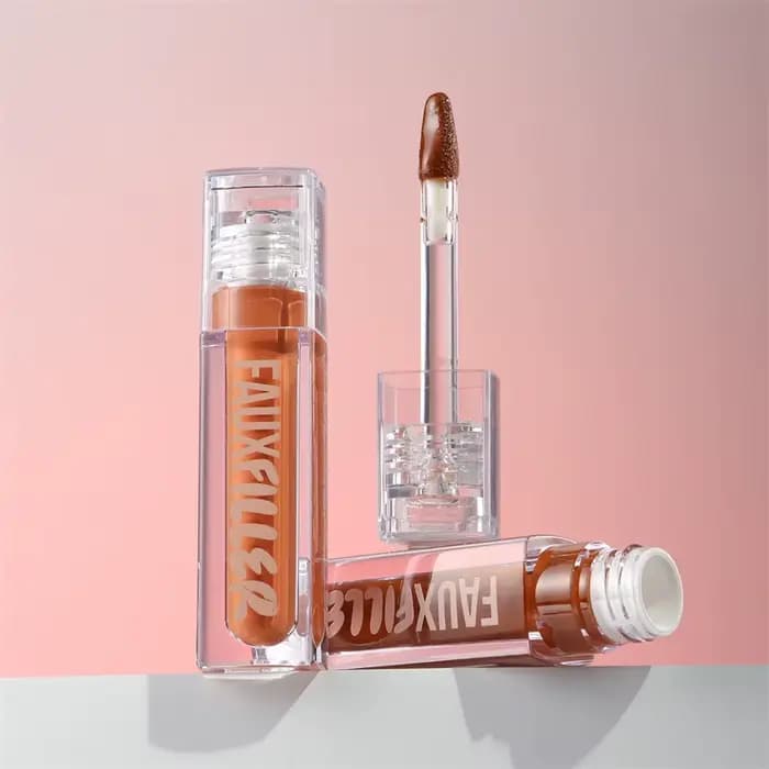 Huda Beauty Faux remplissage brillant Non collant