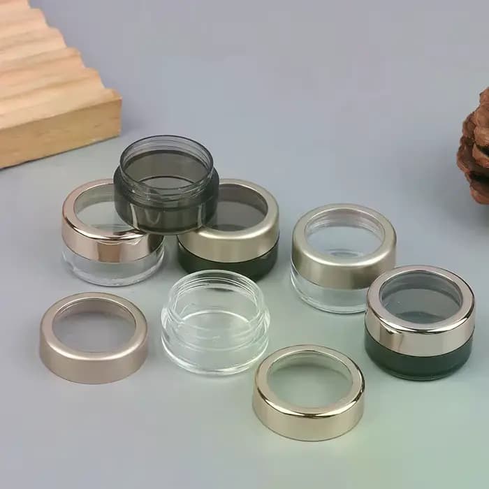 Bouteille transparente en plastique à paillettes