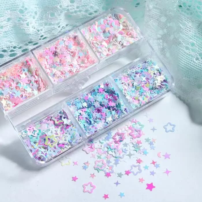 Accessoires pour nail art : étoiles irisées