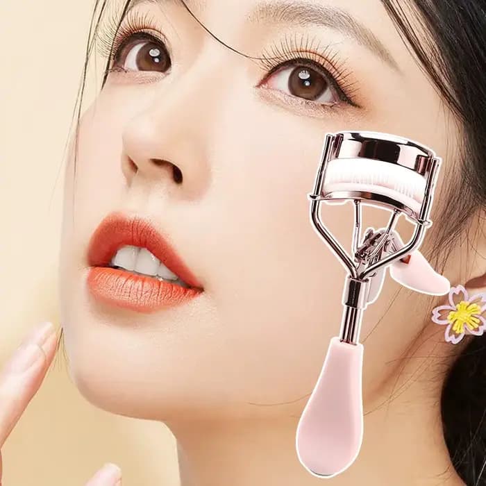 Recourbe-cils professionnel rose avec peigne pour des courbes parfaites
