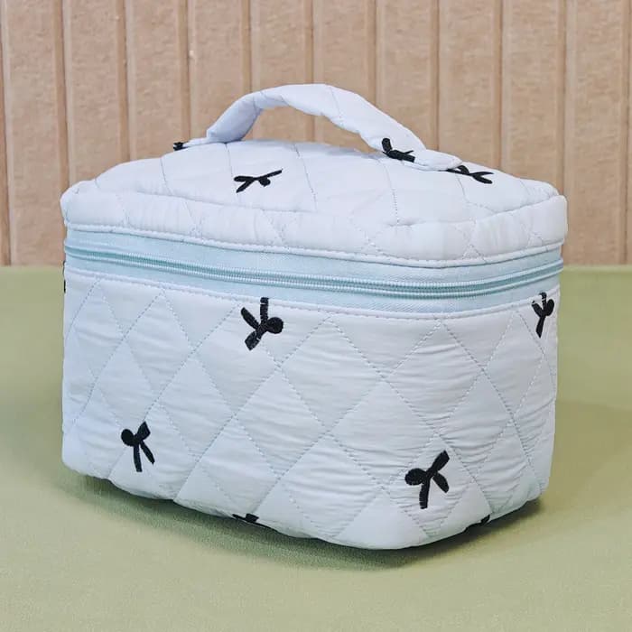 Trousse de maquillage artisanale avec broderie d'arcs