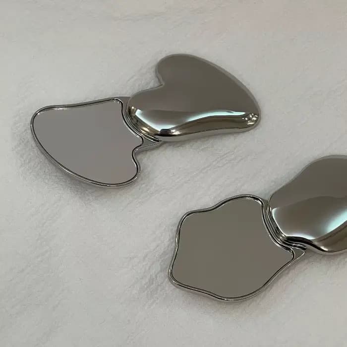 Miroir de maquillage élégant en forme de cœur