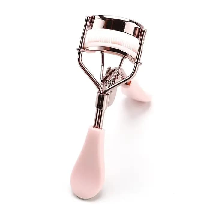 Recourbe-cils professionnel rose avec peigne pour des courbes parfaites