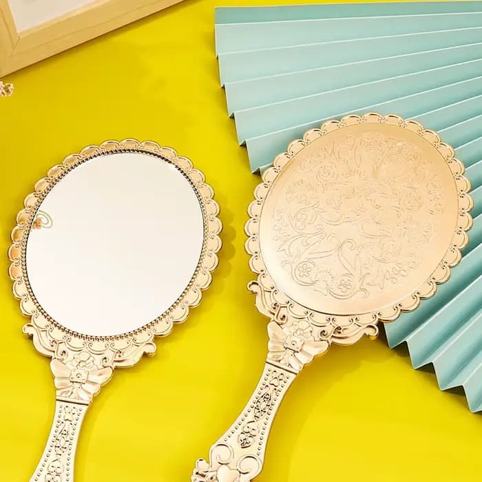 Miroir de maquillage vintage portable en or rose