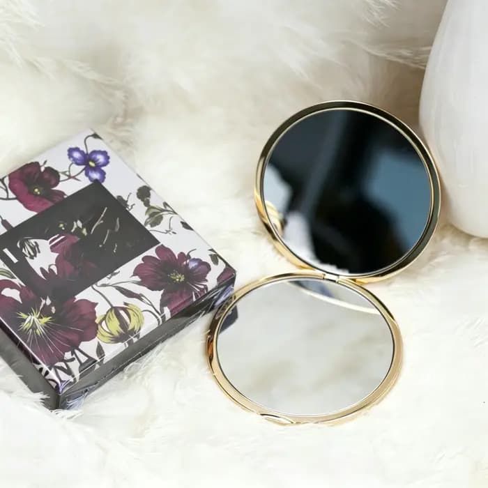 Miroir de poche double face
