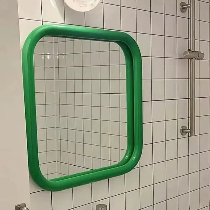 Miroir mural décoratif avec cadre en acier inoxydable